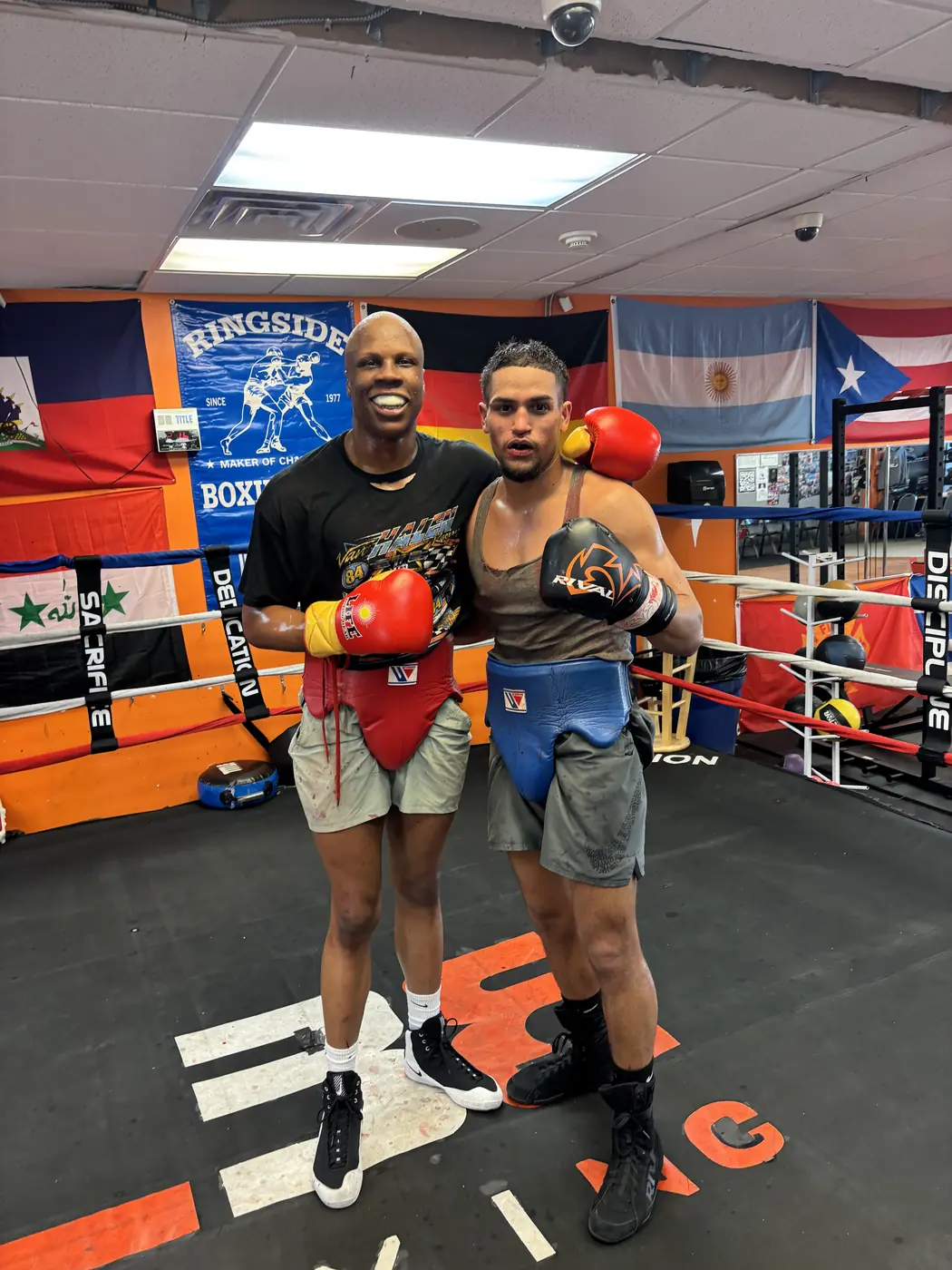 Christian Figueroa and light heavyweight sparring partner Atif Oberlton after training in the boxing gym